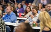 Budget Summit attendee asked questions of presenters.